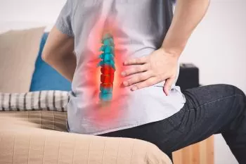 person with lower back pain