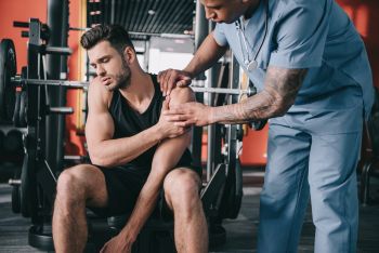 man learning torn labrum shoulder exercises