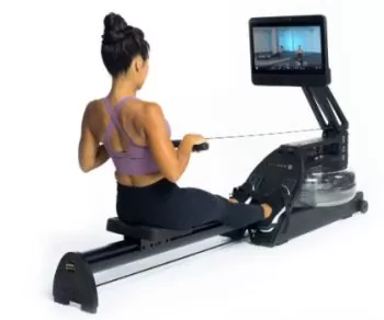 lady working out on a water rower