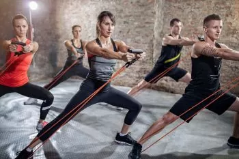 group exercising with resistance bands