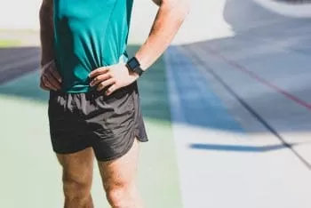 man standing after stretching 