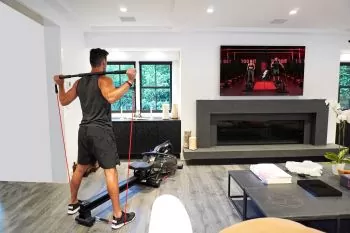 man working out using the LIT rowing machine 