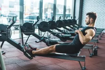 man showing proper seated row form