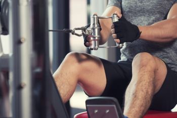 man rowing at the gym