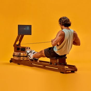Back view of man on Ergatta rower