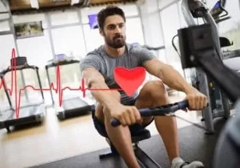 man do a cardio workout on a rowing machine