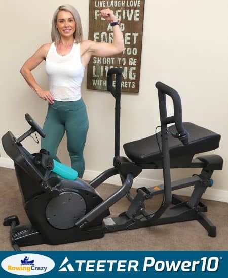 lady standing on the side of Teeter Power10 Elliptical Rower