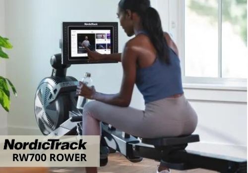 User picking workout options on a NordicTrack RW700 
