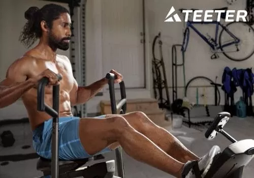 Man exercising on Teeter Power10 Elliptical Rower