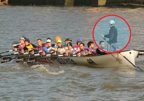 team of rowers rowing at a coxswain camp training course