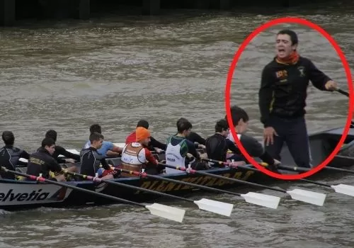 a coxswain facing the rowers and shouting encouragement or instructions 