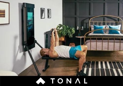 man working out on tonal machine
