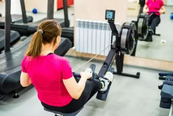 Lady trying indoor rowing