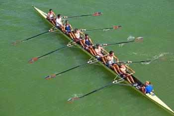Coxed 8 - Eight rowers sweep rowing with a coxswain