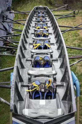 close-up image of a crewing boat with shoes in