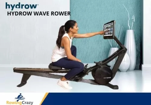 Woman Navigating the touchscreen monitor of a Hydrow Wave rower