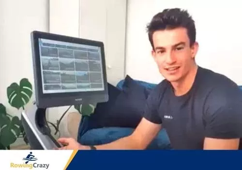 Max Secunda showing the Hydrow rower's HD touchscreen monitor