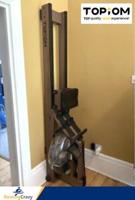 a Topiom water rower stored upright