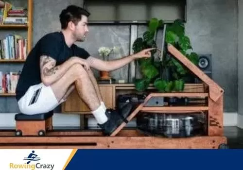 Man working out on the Ergatta Water Rowing Machine
