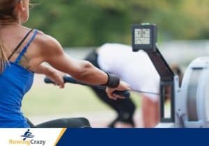 woman working out on a Concept 2 and looking at her force curve