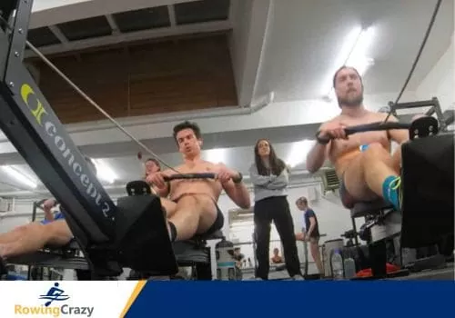 Max Secunda and other rowers during a 2k erg row training session at a gym