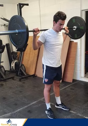 Max Secunda lifting weights to build strength