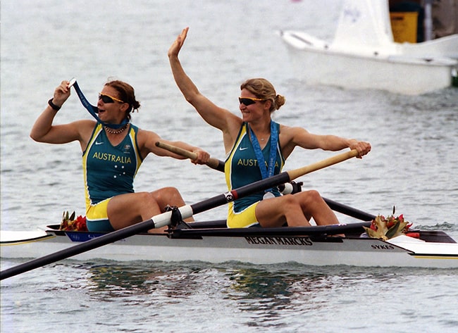 Rachael Taylor Olympic Rower with Kate Slatter wearing the Silver Medals they won as a pair in the Sydney Olympics 2000