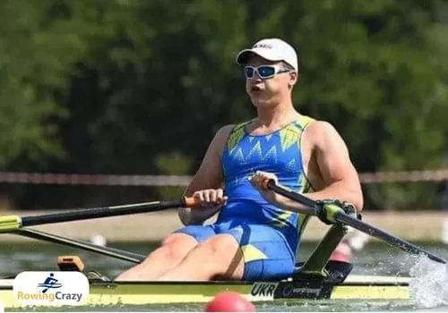 a male rower training in a sculling boat